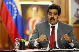 Venezuela's President Nicolas Maduro speaks during a news conference at Miraflores palace in Caracas March 14, 2014. Venezuela's foreign minister lambasted U.S. Secretary of State John Kerry on Friday as a "murderer" fomenting unrest that has killed 28 people in the South American OPEC member nation. REUTERS/Carlos Garcia Rawlins (VENEZUELA - Tags: POLITICS)