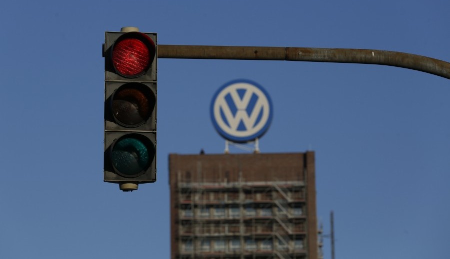 A traffic light shows red next to the Volkswagen factory in Wolfsburg